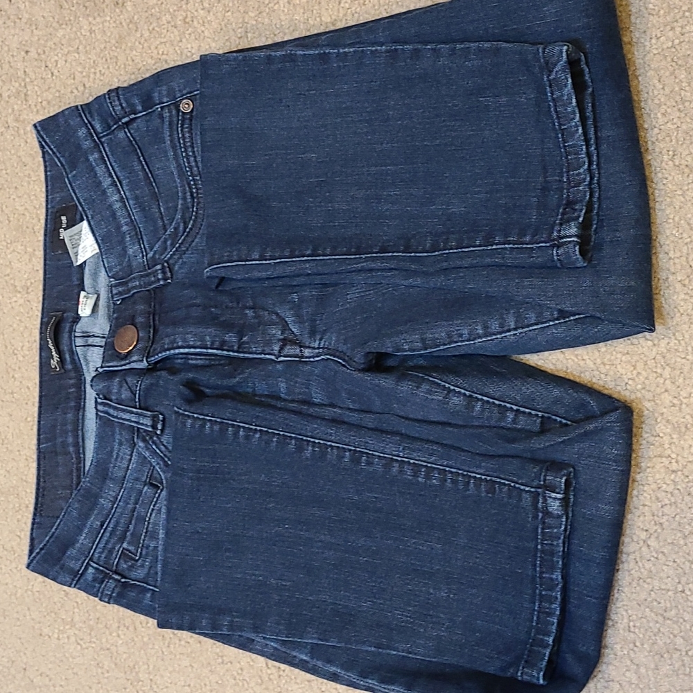 Mid rise skinny jeans in dark wash
